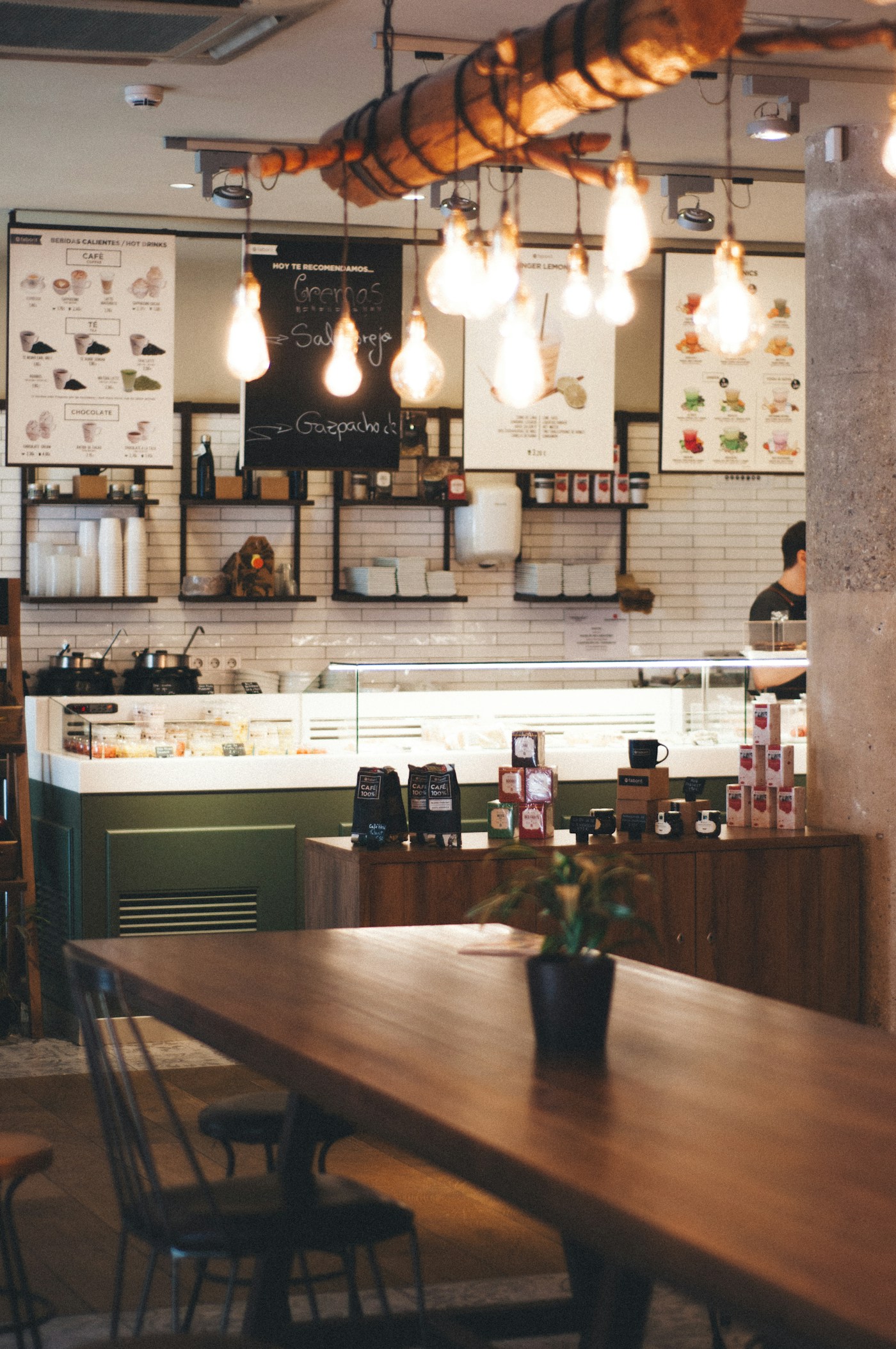 Café interior with a counter and dining tables
